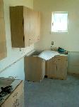 Kitchen cabinets being installed at residence 4/3/12
